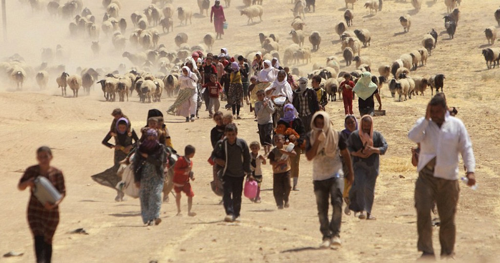  أثناء نزوح الأيزيديين من منطقة سنجار في آب 2014 / Reuters.