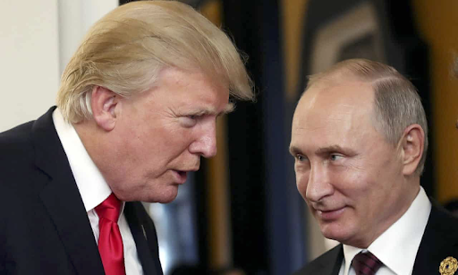 بوتين مع ترامب\ Photograph: Mikhail Kilmentyev/Sputnik/EPA